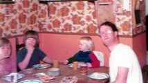 Al, his dad, and 2 (out of 3) sisters. Eating (of course).
